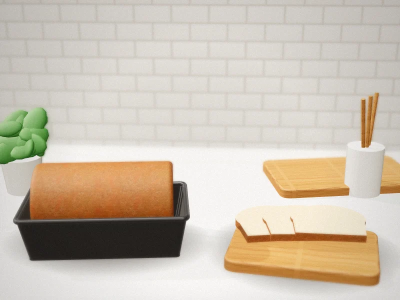 Farberware 9x5 nonstick loaf pan with a baked loaf in a home kitchen
