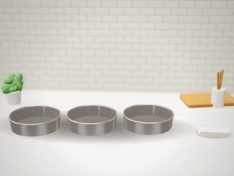 E-far 9 Inch Stainless Steel Cake Pan Set of 3 in a home kitchen